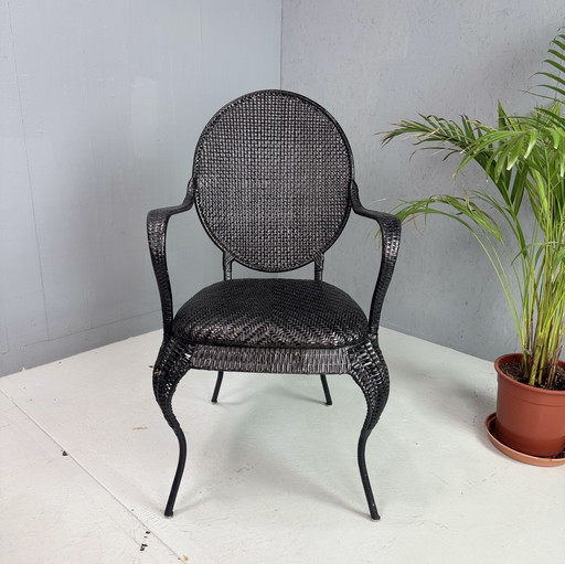 Vintage zwarte rieten/metalen stoel