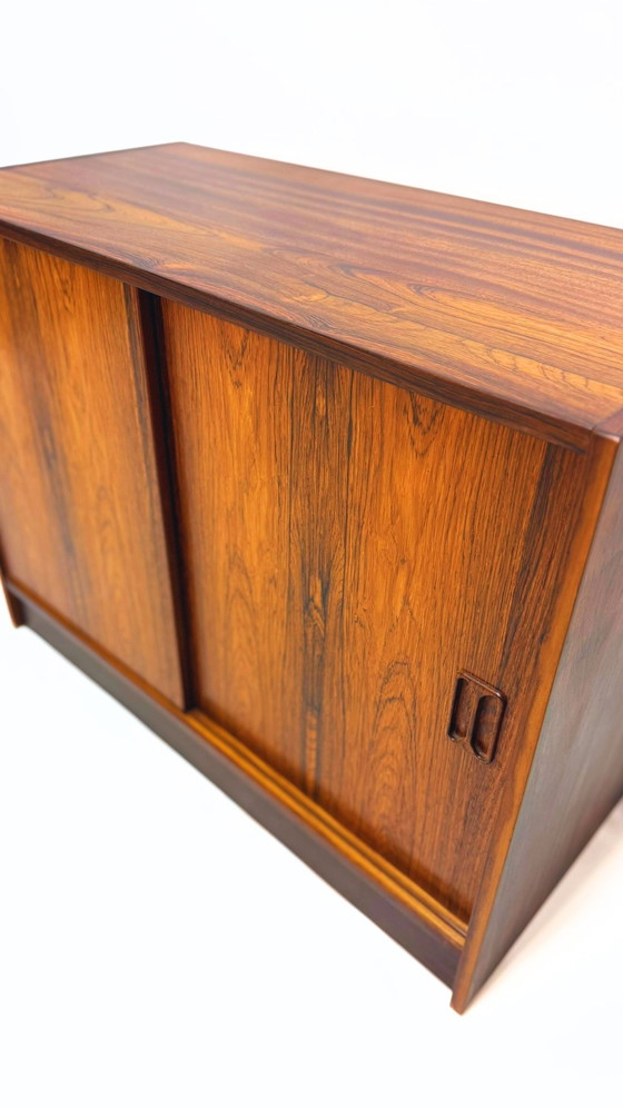 Image 1 of Mid century vintage Danish rosewood cabinet with sliding doors