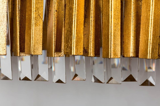 Image 1 of Grande lampe suspendue au design doré