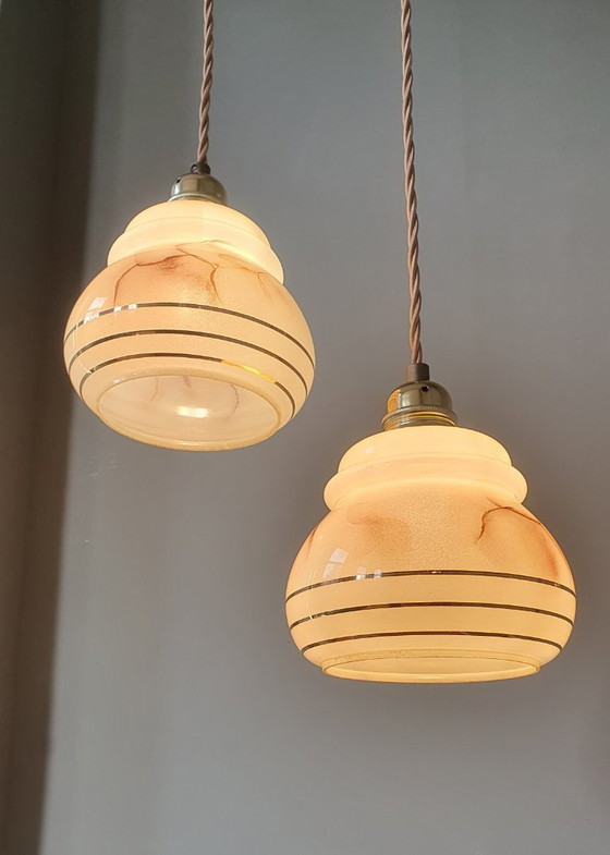 Image 1 of vintage gemarmerde opaline hanglampen met gouden decoratie