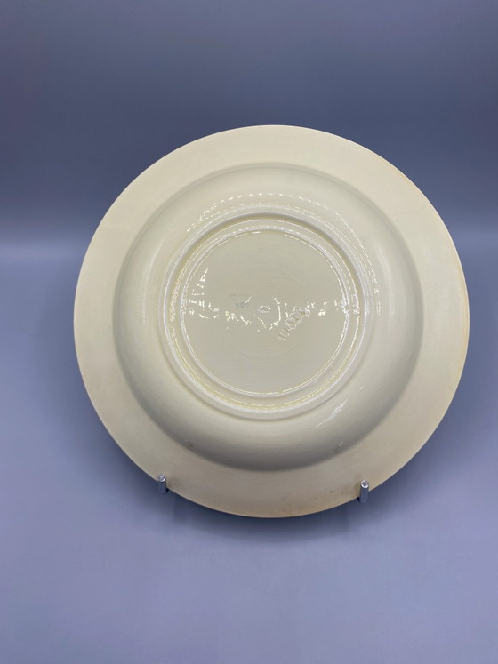 Plat profond en faïence bleue et brune à motifs floraux Art déco – Objets déco, Art Deco (photo 3 of 4)