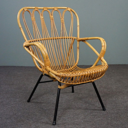 Poltrona in rattan di design olandese molto rara, 1960