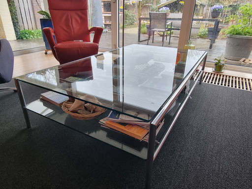 Glass and stainless steel coffee table
