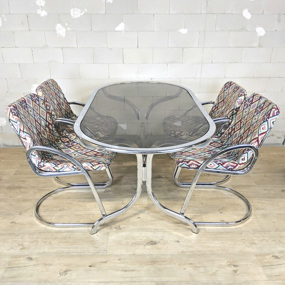 Image 1 of Vintage Gastone Rinaldi voor Rima chroom & rookglas eettafel + stoelen met kleurrijke bekleding (Itiliaans design)