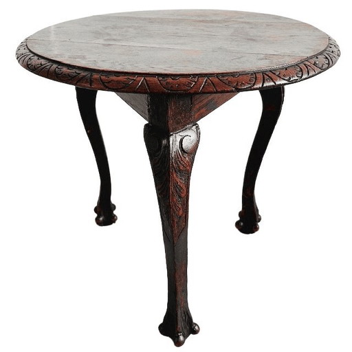 Table d'appoint ronde ancienne avec plateau en bois sculpté et pieds cabriolets en forme de griffes, années 1920