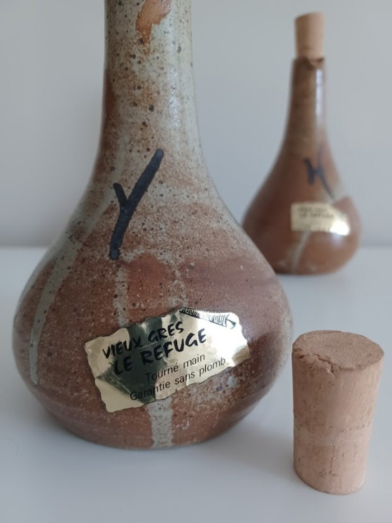Image 1 of Set di due vasi da olio e aceto vintage, fatti a mano. In ceramica. Metà secolo.
