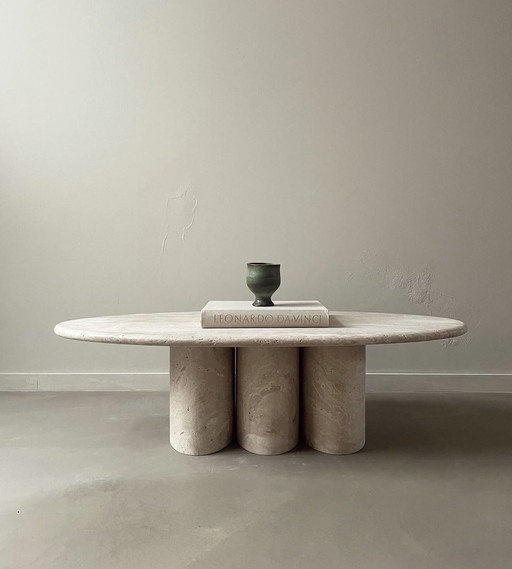 Oval travertine coffee table