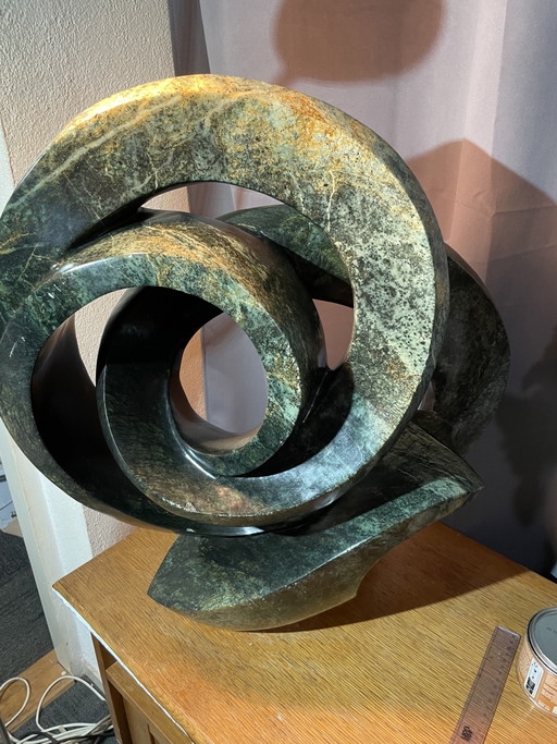 Handmade serpentine Shona sculpture by world-renowned artist Cliff Makore