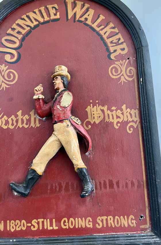 Image 1 of JOHNNIE WALKER – Original vintage wooden plaque with 3D relief figure “The Striding Man” (ca. 1970s)