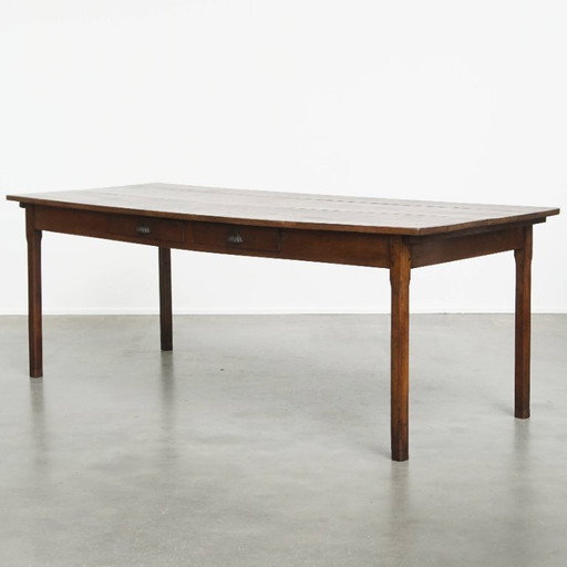 Large antique French dining table from 1800 made of oak with 2 drawers