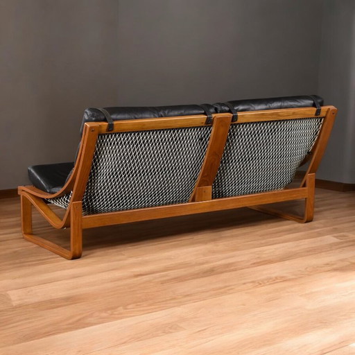 Divano con imbracatura T4 in pelle nera e teak, Fred Lowen per Tessa, anni '70