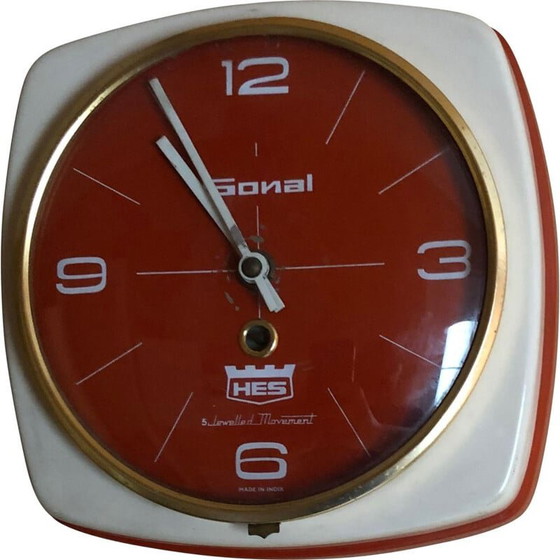 Image 1 of Vintage hes wall clock in heavy metal case, India