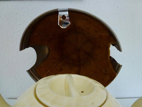 Image 1 of Ceramic Teapot with thermal Chrome casing which keeps the contents hot (or cold).