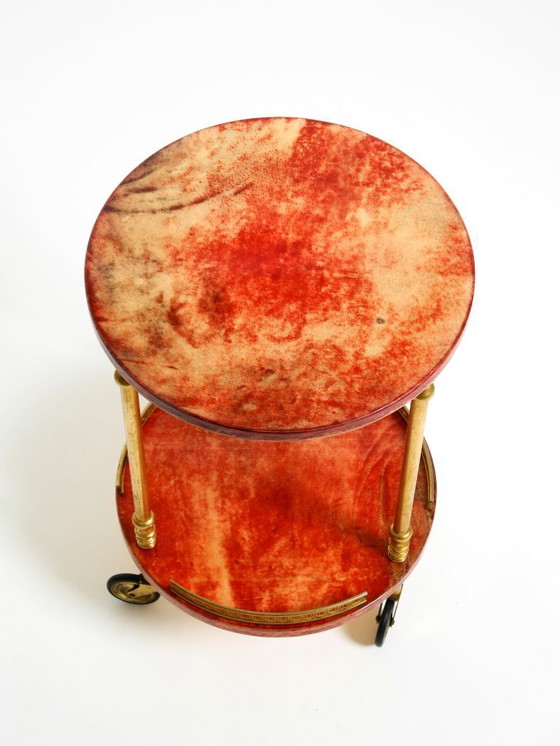 Image 1 of Round, small 1960s Aldo Tura serving or bar trolley in red goatskin leather | Made in Italy