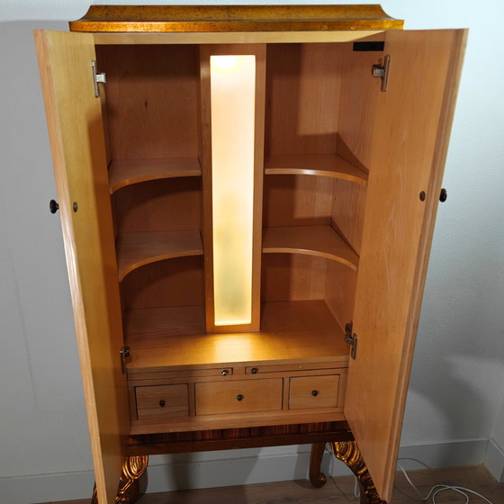 Image 1 of Elegante mueble bar estilo smoking con iluminación de Jansen Furniture: palisandro y arce, pan de oro