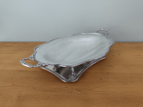 Image 1 of Centrotavola antico in metallo argentato