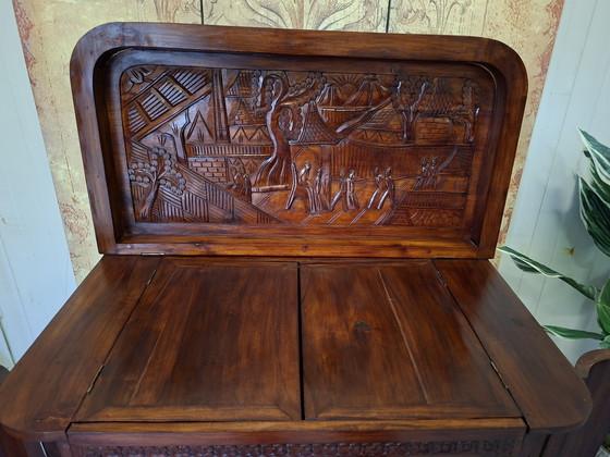 Image 1 of Ancienne armoire de bar, wiskey bar, armoire à vin avec de fines sculptures à la main dim. 90x46cm et 107cm de haut.
