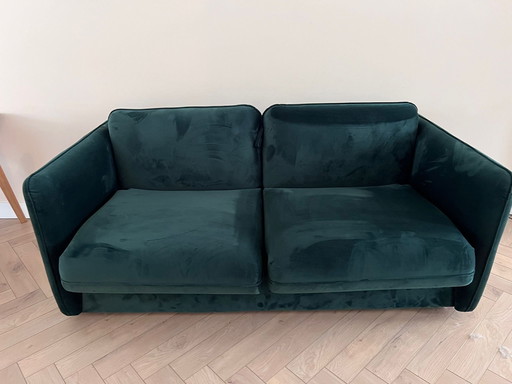 Grüne Schlafcouch