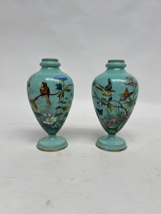 Two unique vases with a bird scene