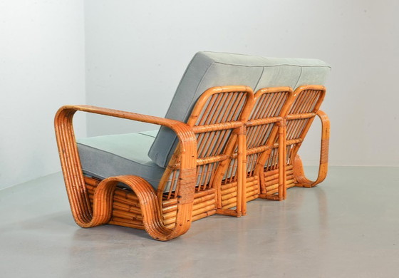 Image 1 of Fabulous Mid-Century Design Six Strand Rectangular Rattan 3-Seat Sofa with Frost Blue Fabric Cushions Attributed to Paul Frankl