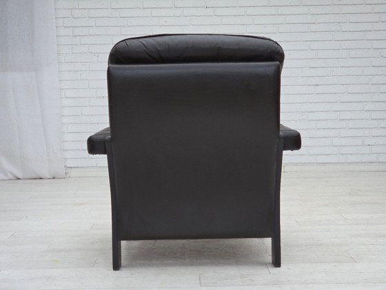 Image 1 of Deense fauteuil uit de jaren 70, bruin meubelleer, eikenhout.