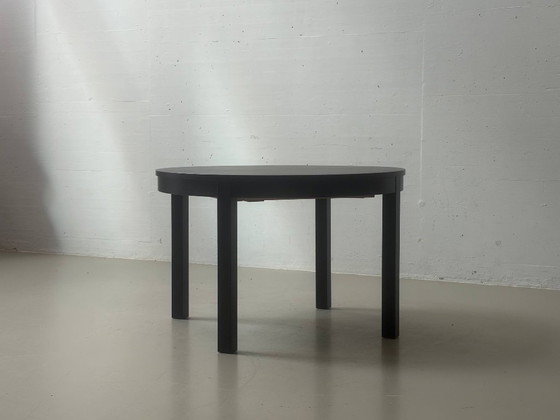 IKEA BJURSTA extendable dining table in black-brown – Wood (photo 8 of 14)