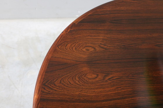 Image 1 of Table de salle à manger extensible en bois de rose par Henning Kjaernulf