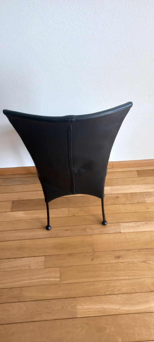 4 comfortable leather dining chairs