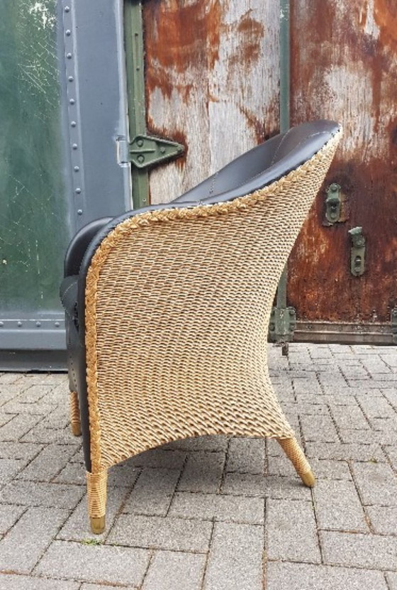 Image 1 of 1x poltrona LlOYD LOOM Ambienz Club in pelle marrone scuro + rattan