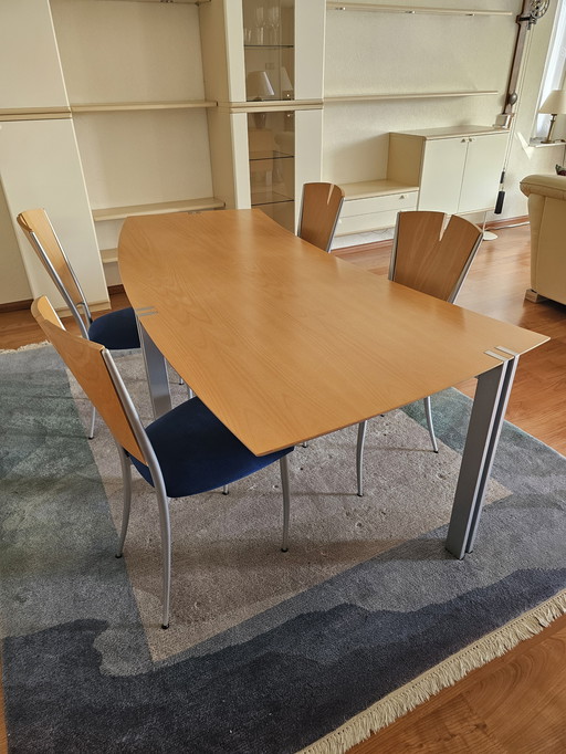 Modern dining room table with chairs