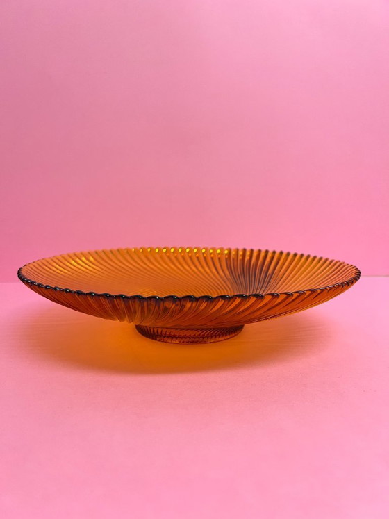 Image 1 of Vintage 70s swirl amber glass amber sunburst fruit bowl sawtooth edge orange