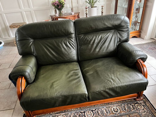 2x 2 seater sofa and 1× armchair dark green leather