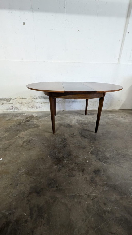Image 1 of Vintage extendable dining table - round model in teak veneer- mid - Century