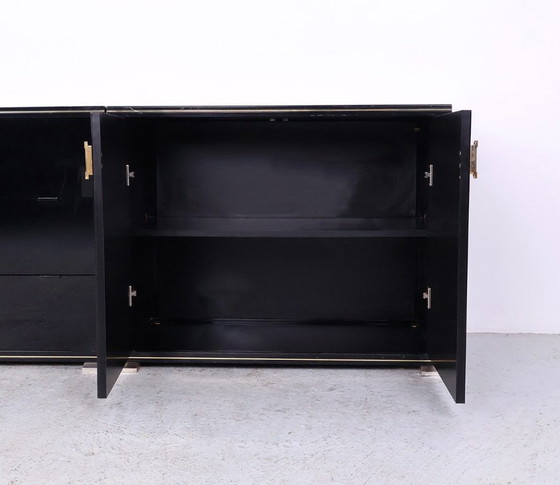 Image 1 of Black and gold Art Deco cabinets by Pierre Vandel, 1970s