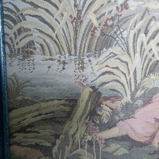 Hand-woven tapestry in a modernist metal frame