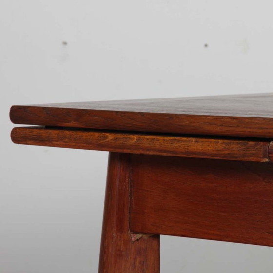 Image 1 of Extendable oak dining table from the 1950s
