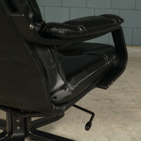 Image 1 of Vintage Unico draaifauteuil met hocker – jaren 70