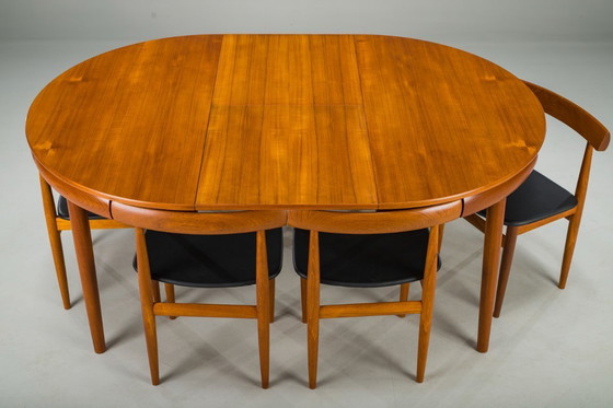 Image 1 of Mesa de comedor extensible y sillas danesas de teca de Hans Olsen para Frem Røjle, años 60, juego de 7