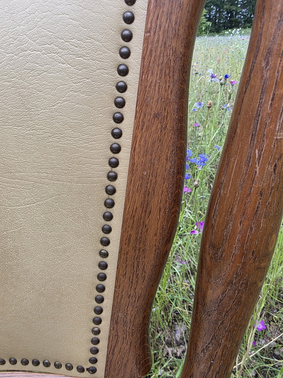 Image 1 of Set of 2 solid oak chairs with decorative nails