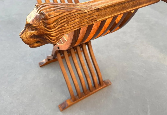 Image 1 of Sedia pieghevole Savonarola in legno intagliato con teste di leone – vintage ca. 1910–1950