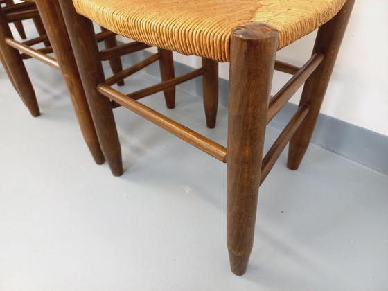 Image 1 of Set van 4 vintage brutalistische stoelen van hout en stro uit de jaren 60.