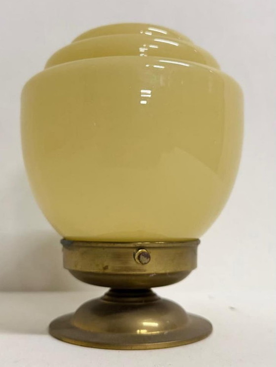 Image 1 of Art Deco Thabur lamp brass fixture yellow glazed stepped shade