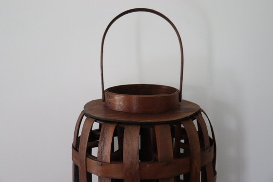 Image 1 of Farol de viento con diseño tejido