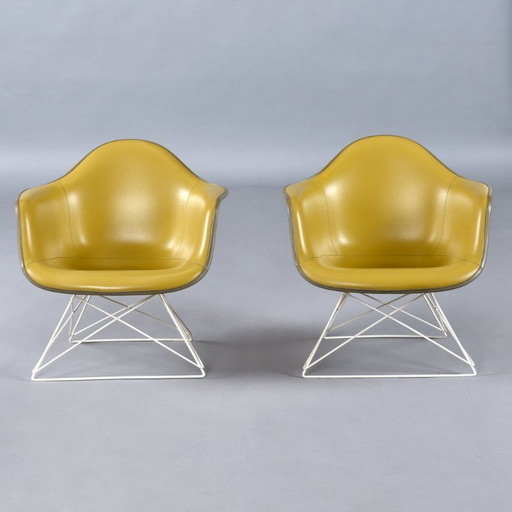 Pair of Eames for Herman Miller LAR Shell Chairs with Yellow Naugahyde Pads