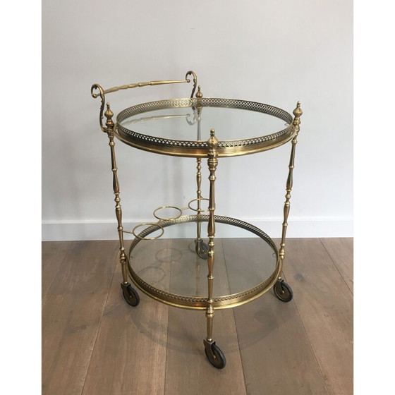 Image 1 of Vintage brass and glass table on wheels, 1940