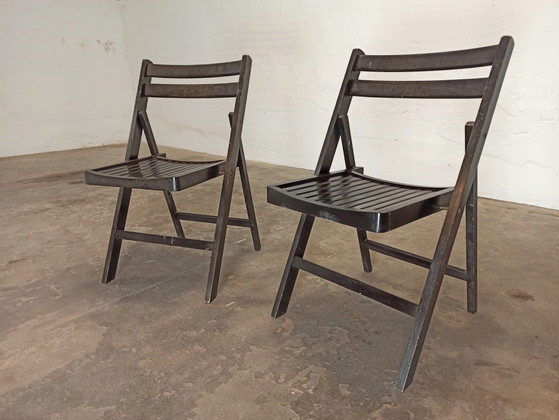 Image 1 of 2 vintage zwarte houten klapstoelen