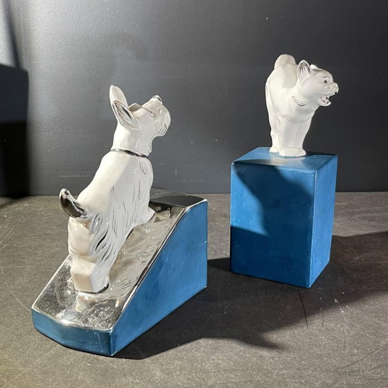 Fermacarte Art Déco Asimmetrici in Cromo Bianco Blu & Ceramica, Anni '30, Set di 2 – Oggetti decorativi (photo 14 of 17)
