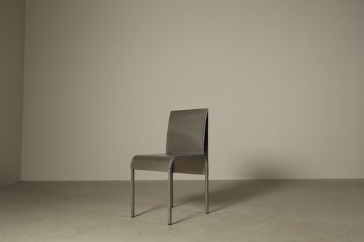 Set of six postmodernist stainless steel dining chairs from circa 1980-1990.