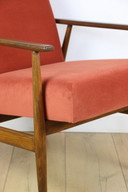 Armchair 'Lis', 1970s design by Henryk Lis, orange-brick - 2 pieces available