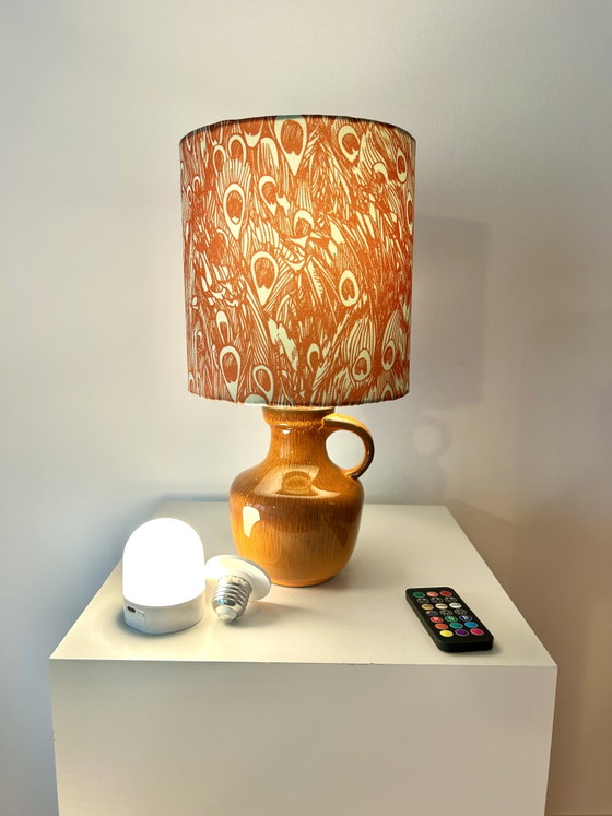 Image 1 of Lampada vintage arancione brillante, senza fili, adatta per uso esterno.